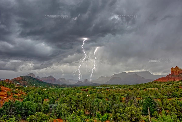 Lightning striking in between Courthouse Butte and Bell Rock near ...